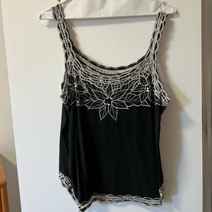 FREE PEOPLE FLORAL TANK. SIZE M.